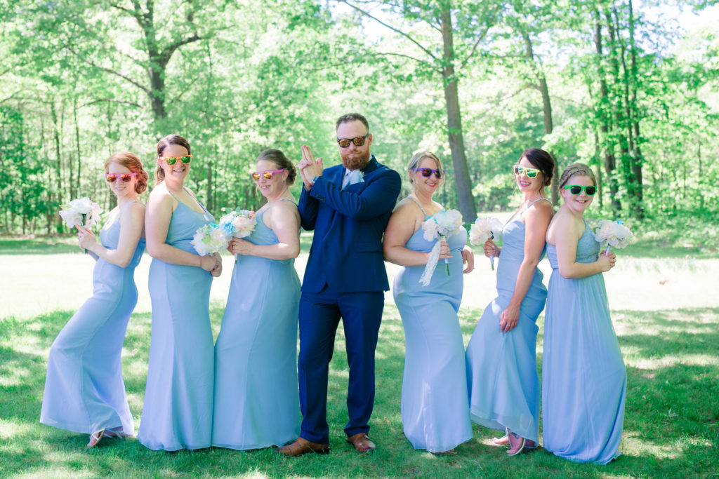 bridesmaids-with-groom-wearing-glasses