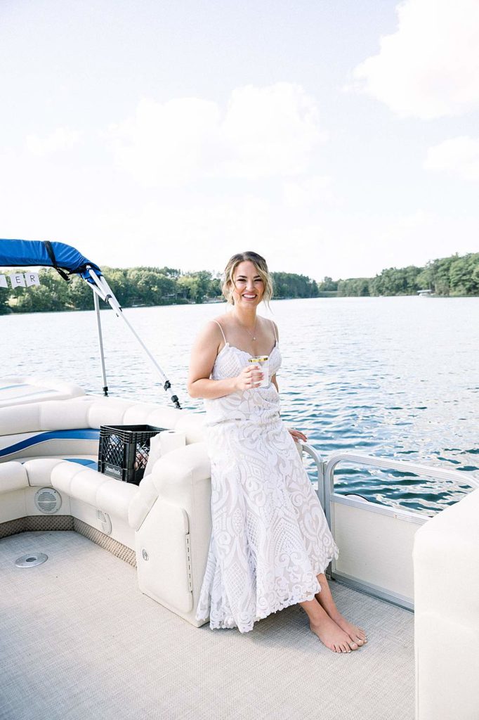 bride-sitting-on-boat-wedding-pictures-michigan